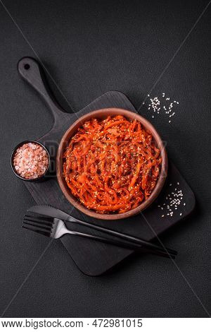 Dried Squid Chopped Into Slices And Seasoned With Sesame Seeds And Spices
