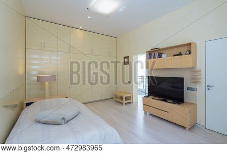 Modern Scandic Interior In Beige Tones Of Bedroom In Luxury Apartment.