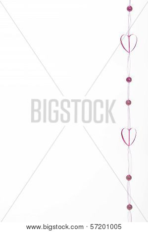 Hearts with pink pearls on Ribbon Border.