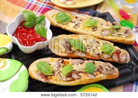 Baquette arrosto con formaggio e funghi