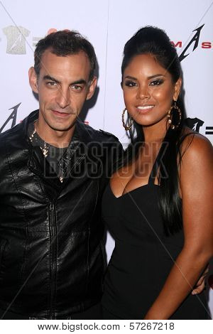 Adam Saaks and Miss Issa at the Adam Saaks Flagship Store Opening, Adam Saaks Store, Los Angeles, CA. 10-10-10