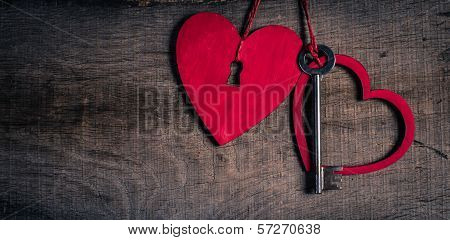 Key with the hearts as a symbol of love. Heart with a keyhole.