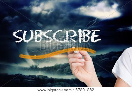 Businesswoman writing the word subscribe against stormy sky with tornado over landscape