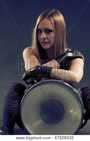 Young Woman Sitting With Drum; Indoor
