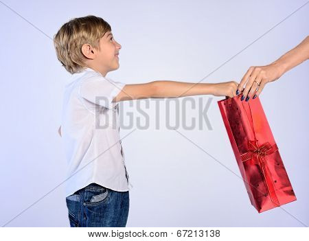 Young Boy Offer Gift To Woman