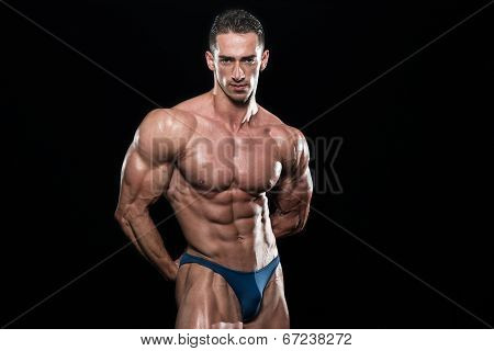 Portrait Of A Bodybuilder Isolate On Black Blackground