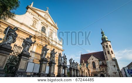 KRAKOW, POLAND - AUGUST 24: The early Baroque Church of St. Peter and St. Paul and the statues of the twelve apostles on Grodzka in the city of Krakow in Poland on 24 august 2013. Dates from 1596.