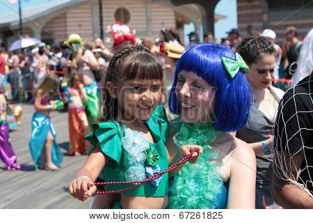 Mother & daughter in aquatic costume
