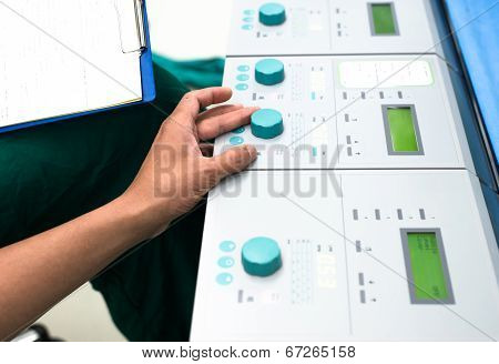 Perfusionist Control Heart Lung Machine In Operating Room