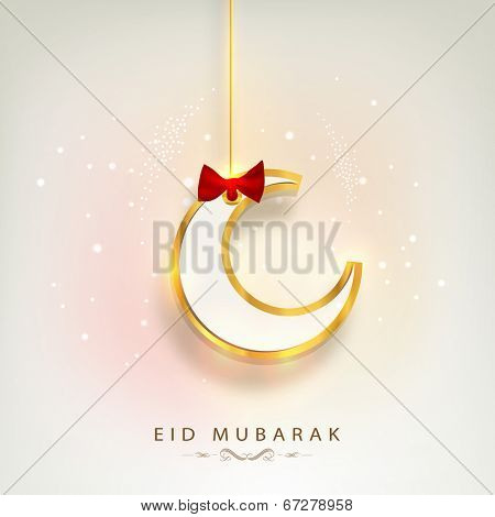 Hanging golden moon with red ribbon on beige background for muslim community festival Eid Mubarak. 