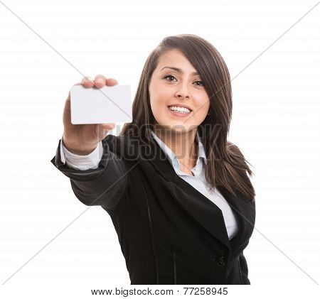 Young attractive businesswoman showing blank business card