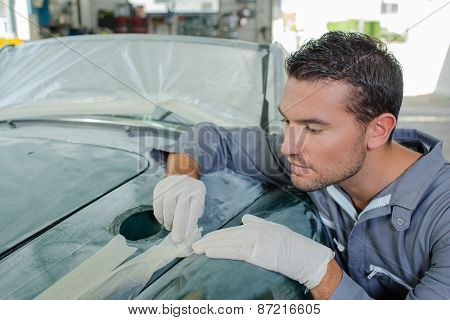 Sanding down a car