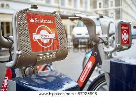 LONDON, UK - APRIL 02: Detail of Boris bikes in line. April 02, 2015 in London. On 27 February 2015. Mayor Boris Johnson secured Santander's sponsorship on the bike's scheme to replace Barclays bank.