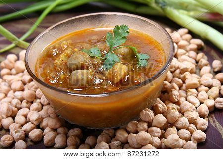 Indian Spicy Chana Masala With Raw Chickpeas And Green Onion
