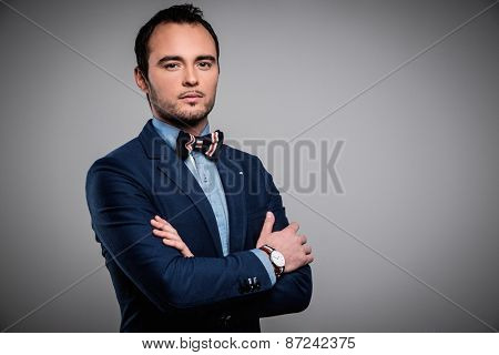 Sharp dressed fashionist wearing jacket and bow tie