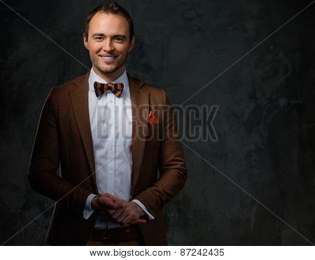 Sharp dressed fashionist wearing jacket and bow tie