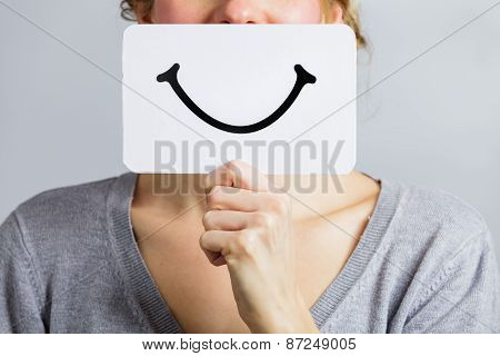 Happy Portrait Of Someone Holding A Smiling Mood Board