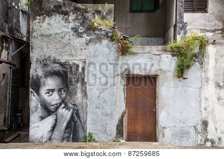 George Town,penang ,malaysia- Circa March 26, 2015: Public Street Black And White Boy Painting Stree