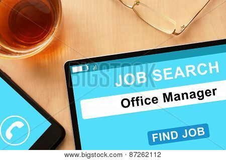 Tablet with Office Manager on job search site.