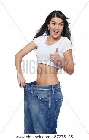 Young woman delighted with her dieting results