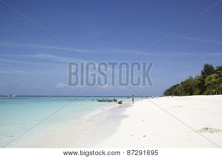 Traveler Swimming On The Clear Water Beautiful Sea