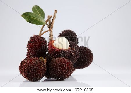 pulasan  thick skin or wild rambutan on the white background