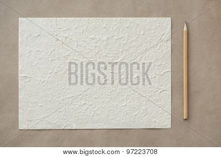 Sheet and pencil