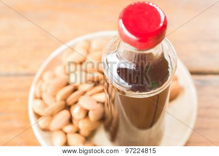 Bottle Of Black Iced Coffee With Almond Grain