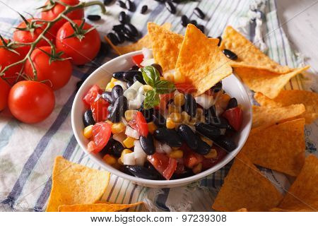 Mexican Cuisine: Tasty Salsa And Corn Chips Nachos Close-up. Horizontal