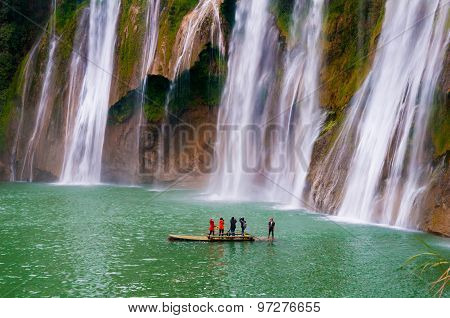 Tourists visit Jiulong waterfall in Luoping, China.
