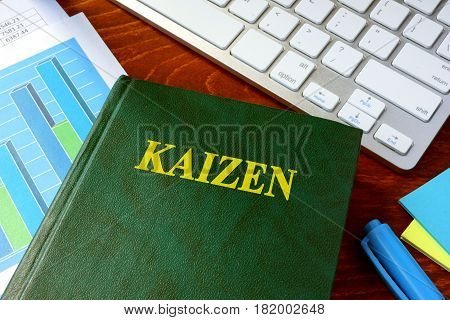 Book with title Kaizen. Continuous improvement concept.