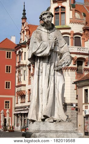 MARIBOR, SLOVENIA - APRIL 03: Saint Anthony of Padua statue, Plague column at Main Square of the city of Maribor in Slovenia, Europe. Historical religious sculpture, April 03, 2016.