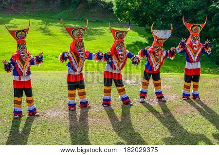 Kid dancers with ghost masks made from bamboo to show in Thai northeastern traditional Phi Ta Khon ghost Festival