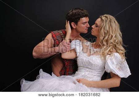 The naughty couple is in a beautiful embrace.