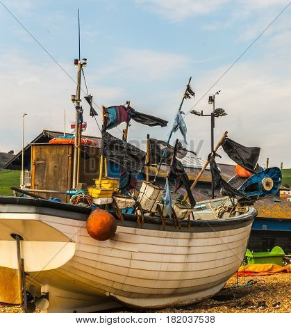 View Of The Seaside Town, Fishing Boats On The Shore, Stony Beach, Hill