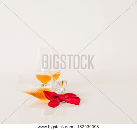 Set Of Single Malt Tasting Glasses, Single Malt Whisky In A Glasses, White Background, Red Bow
