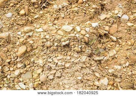 Background wall made of stone. Fragment of a wall from a chipped stone