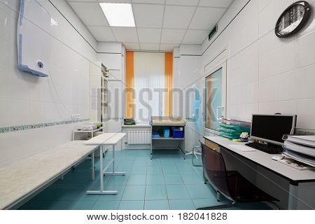 Interior of medical office with furniture and equipment.