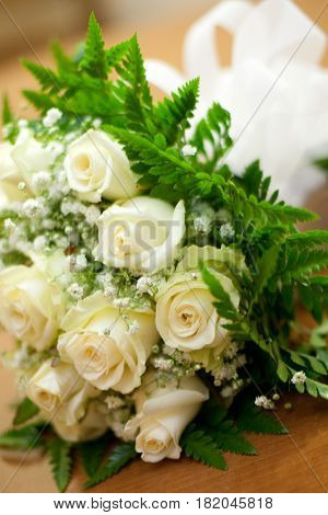 Bucket of white flowers for a bride