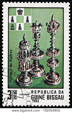 GUINEA-BISSAU - CIRCA 1983: a stamp printed in Guinea-Bissau shows Chess Pieces History of Chess circa 1983