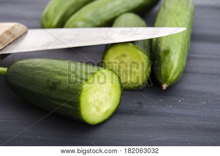 Cucumber, organic natural sailor cucumber pictures, cutting a cucumber with a knife, cucumber pictures on different topics