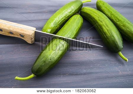 Cucumber, organic natural sailor cucumber pictures, cutting a cucumber with a knife, cucumber pictures on different topics