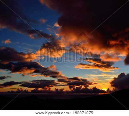 Beautiful dawn with vibrant sky and clouds of color