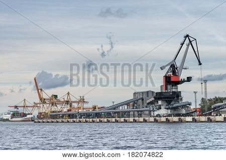 Maritime transportation industry. Container transshipment at port.