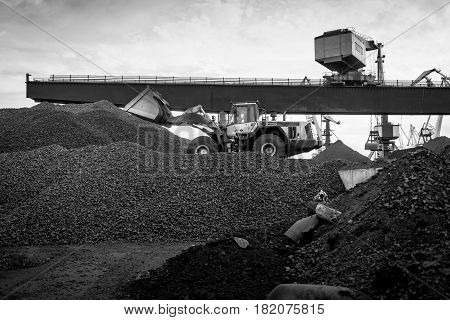Maritime transportation industry. Work in port coal transshipment terminal.