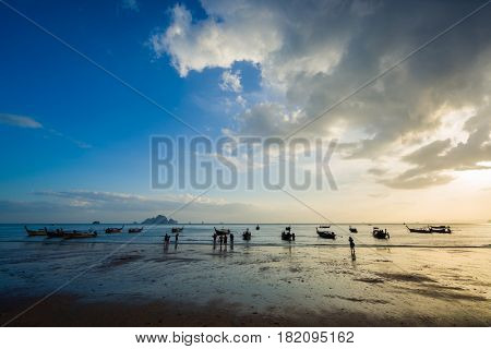 People on the beach in Ao Nang Krabi at sunset