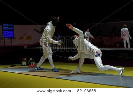 KIEV, UKRAINE - APRIL 14, 2012: One of fights during World Fencing Championship. It was the only events were the women's team sabre and men's epee team in 2012