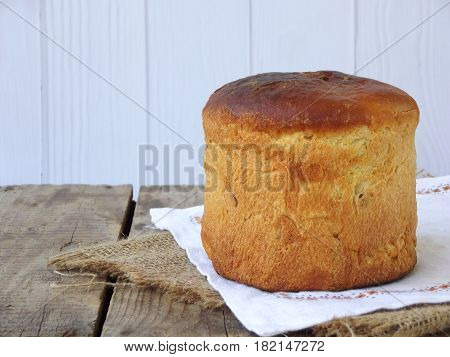 Easter Composition Of Sweet Bread, Paska And Eggs On Wooden Background. Orthodox Kulich. Holidays Br