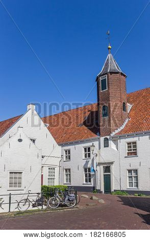 White Houses And Tower In Muurhuizen Street Of Amersfoort