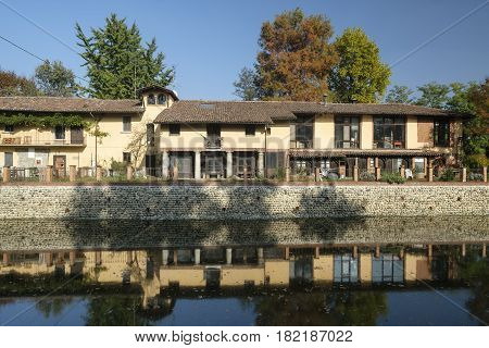 Turbigo (Milan Lombardy Italy): industrial chimneys along the Naviglio Grande